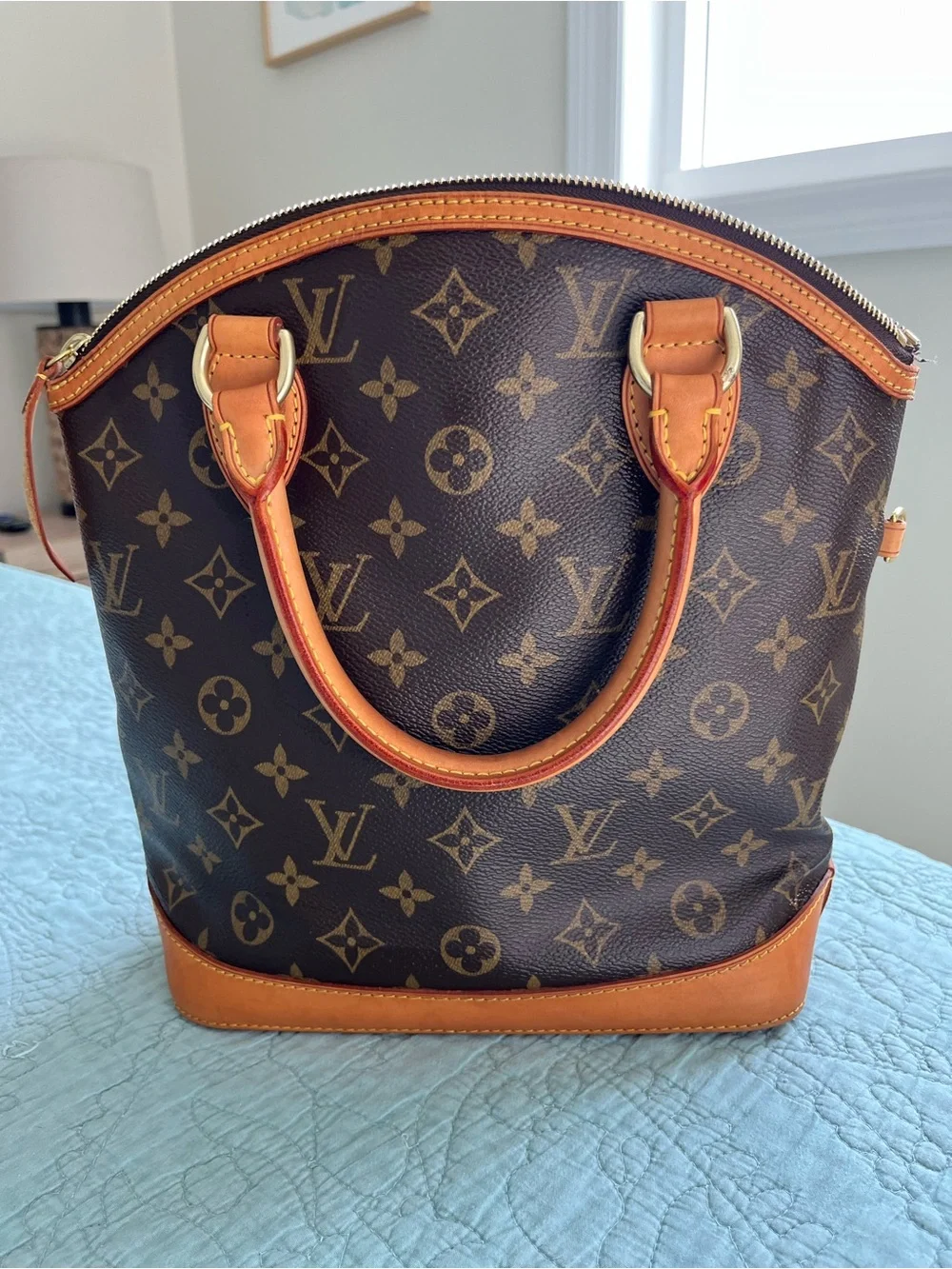 Louis Vuitton Lock It Vertical Monogram Handbag and LV amfar envelope